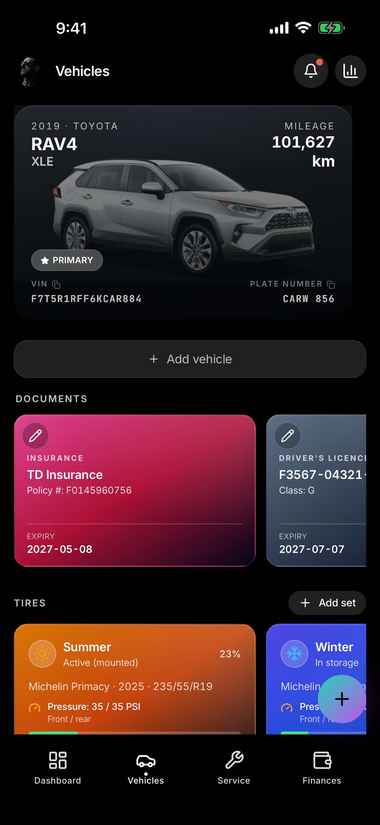 Car Wallet Vehicles screen on iPhone, with documents and tire details.